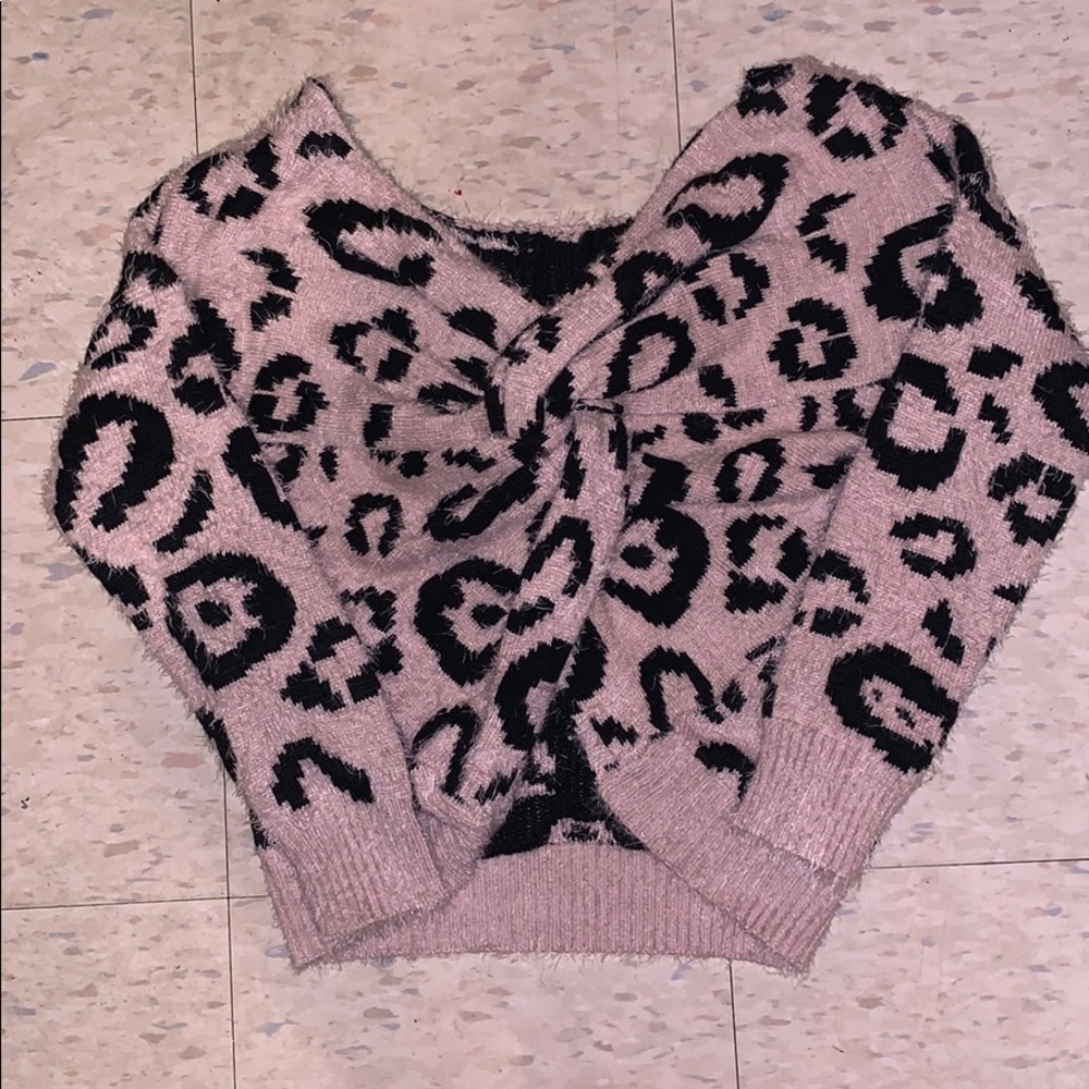 Pink cheetah print twist-back sweater. Never worn